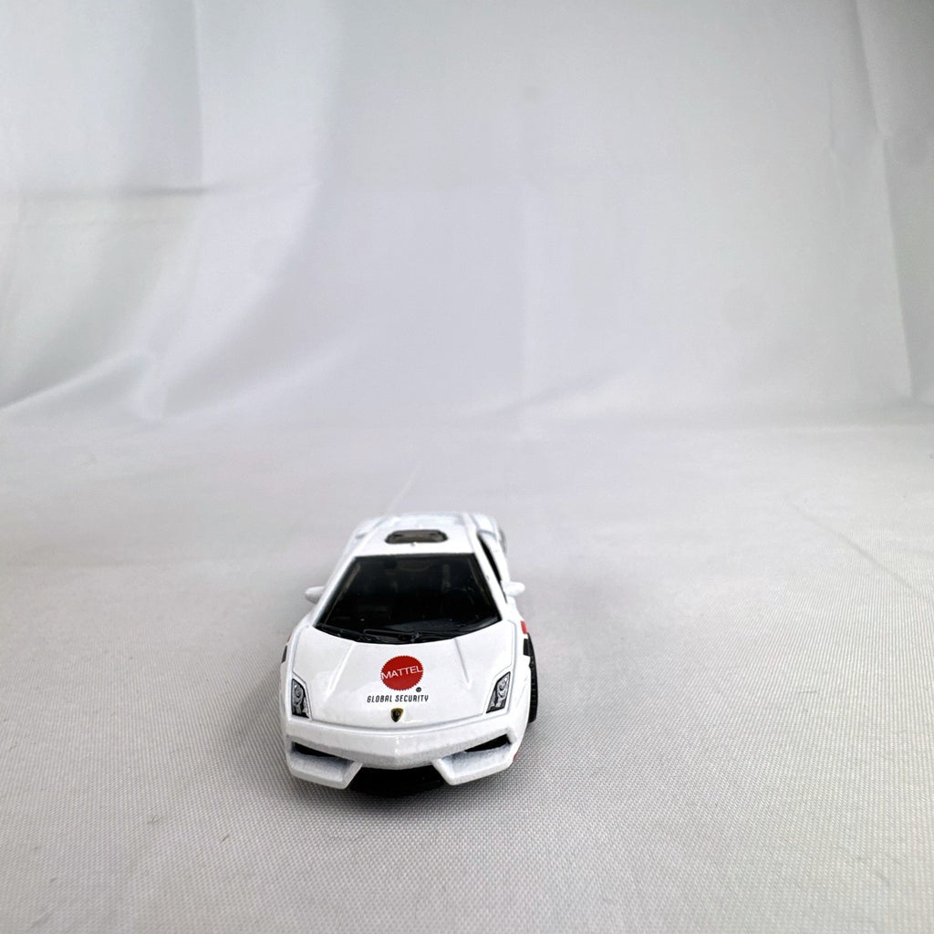 White Matchbox 1:64 scale Lamborghini Gallardo LP 560-4 Mattel Global Security diecast car with roof light bar