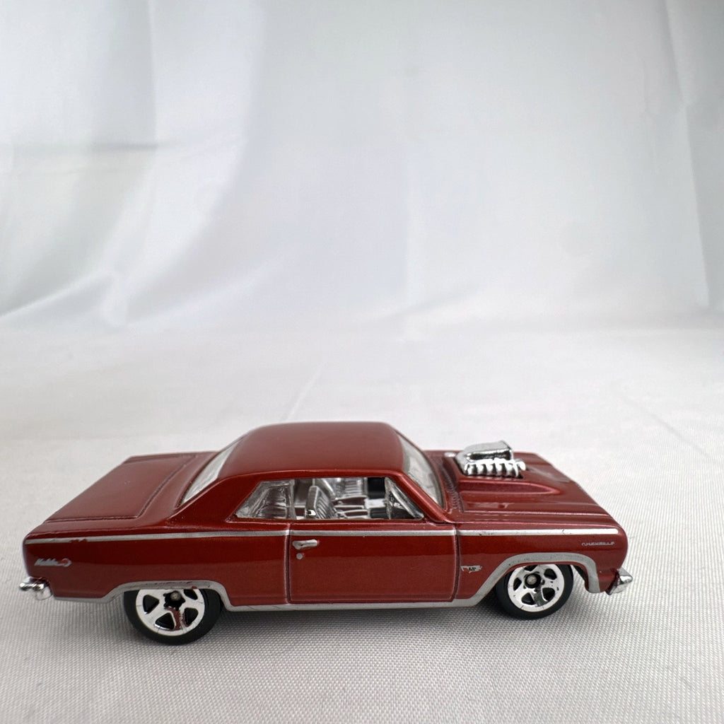 Hot Wheels 1:64 scale 1964 Chevrolet Chevelle SS diecast car in metallic dark red with exposed chrome blower