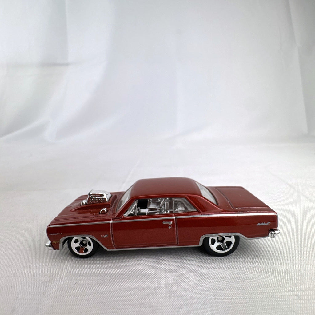 Hot Wheels 1:64 scale 1964 Chevrolet Chevelle SS diecast car in metallic dark red with exposed chrome blower