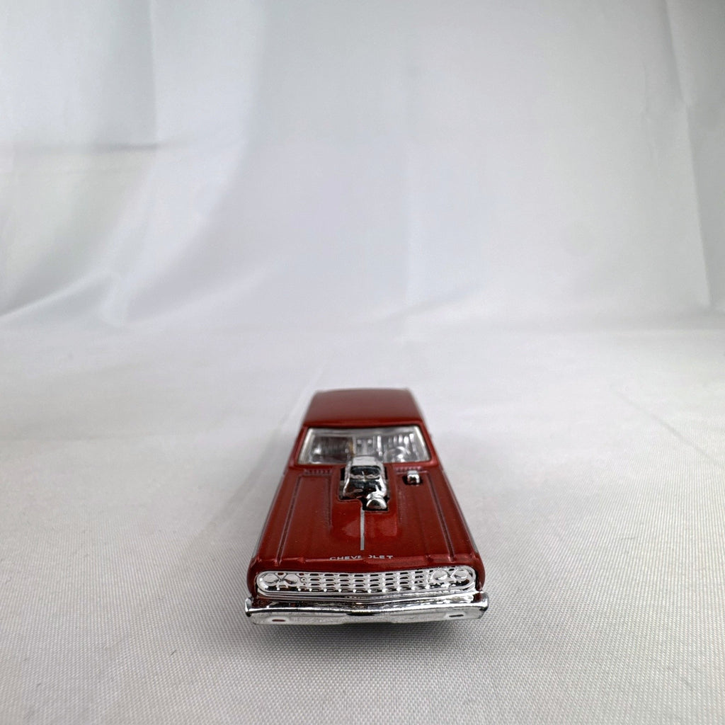 Hot Wheels 1:64 scale 1964 Chevrolet Chevelle SS diecast car in metallic dark red with exposed chrome blower