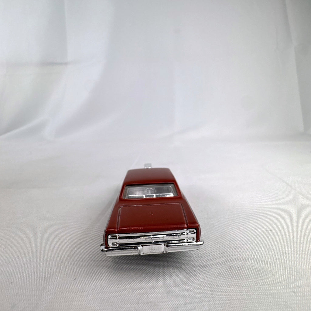 Hot Wheels 1:64 scale 1964 Chevrolet Chevelle SS diecast car in metallic dark red with exposed chrome blower