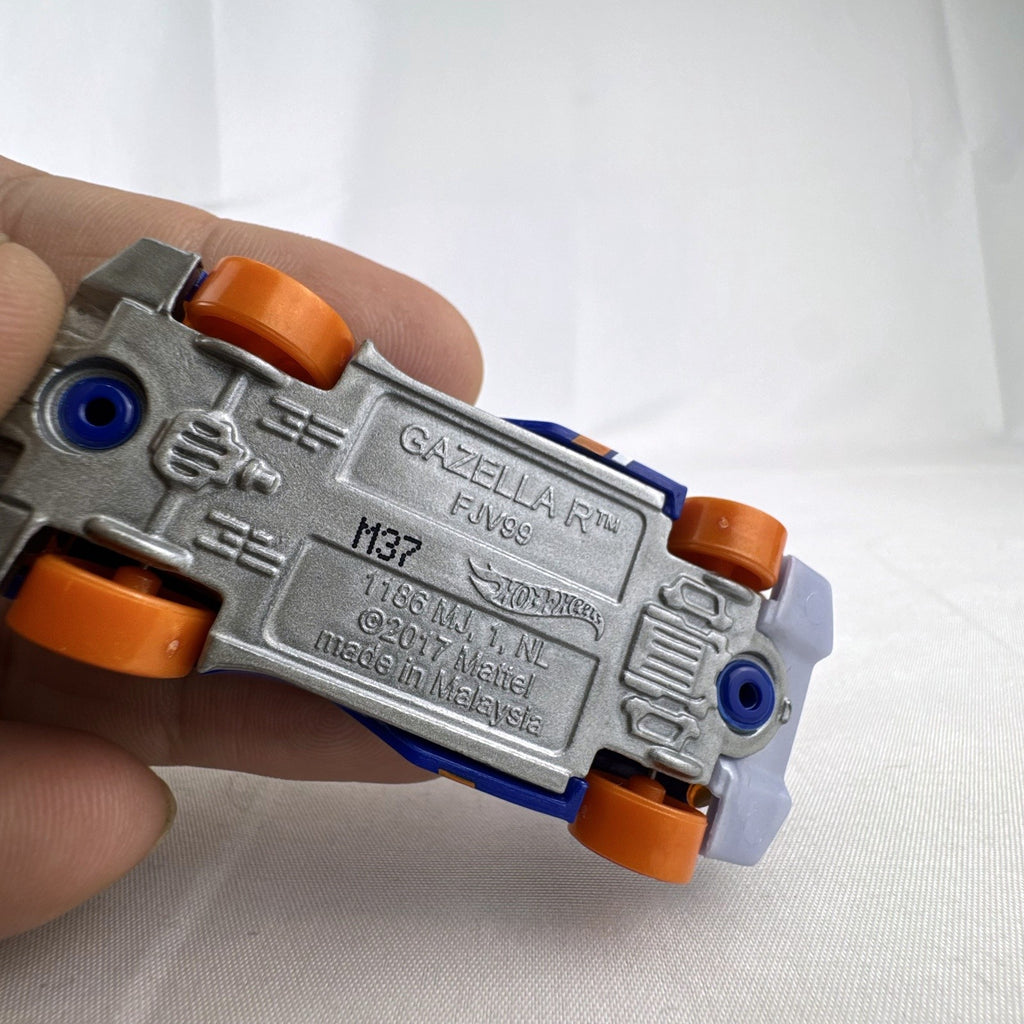 Hot Wheels Gazella R 1:64 scale diecast car in blue with orange canopy and wheels