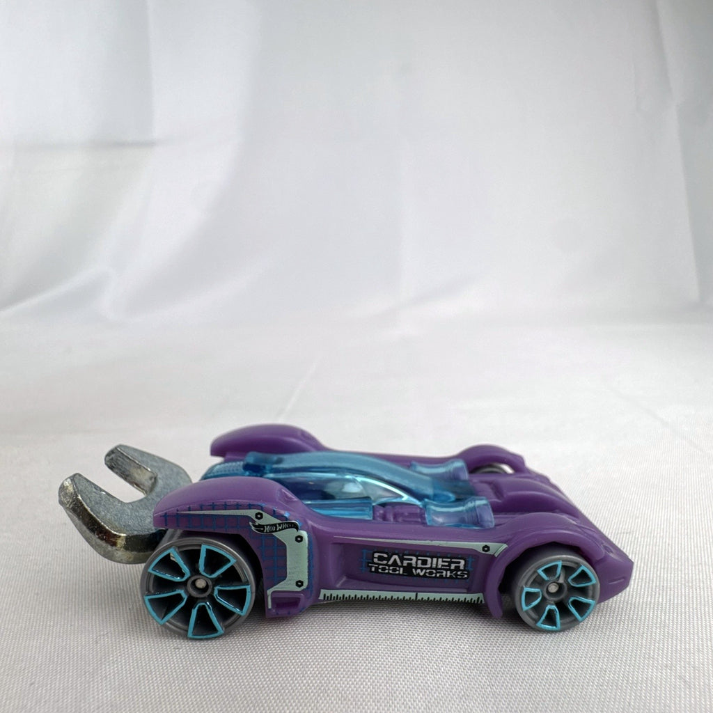 Hot Wheels Experimotors Tooligan 1:64 scale diecast car in purple with integrated wrench tail