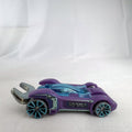 Hot Wheels Experimotors Tooligan 1:64 scale diecast car in purple with integrated wrench tail