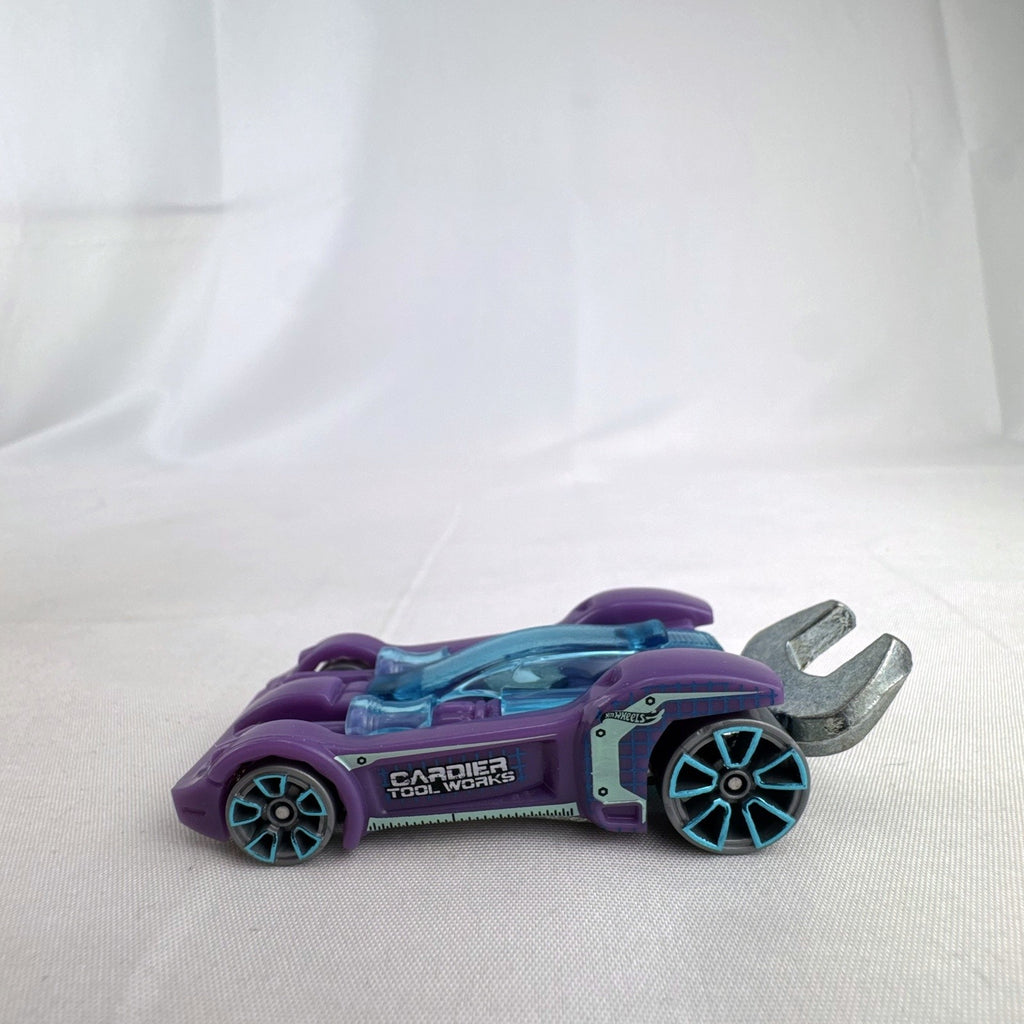 Hot Wheels Experimotors Tooligan 1:64 scale diecast car in purple with integrated wrench tail