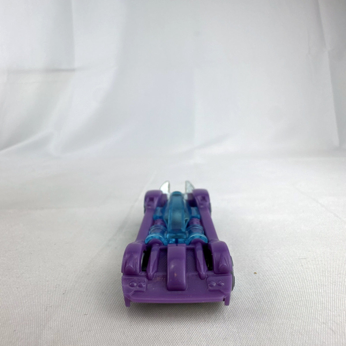 Hot Wheels Experimotors Tooligan 1:64 scale diecast car in purple with integrated wrench tail