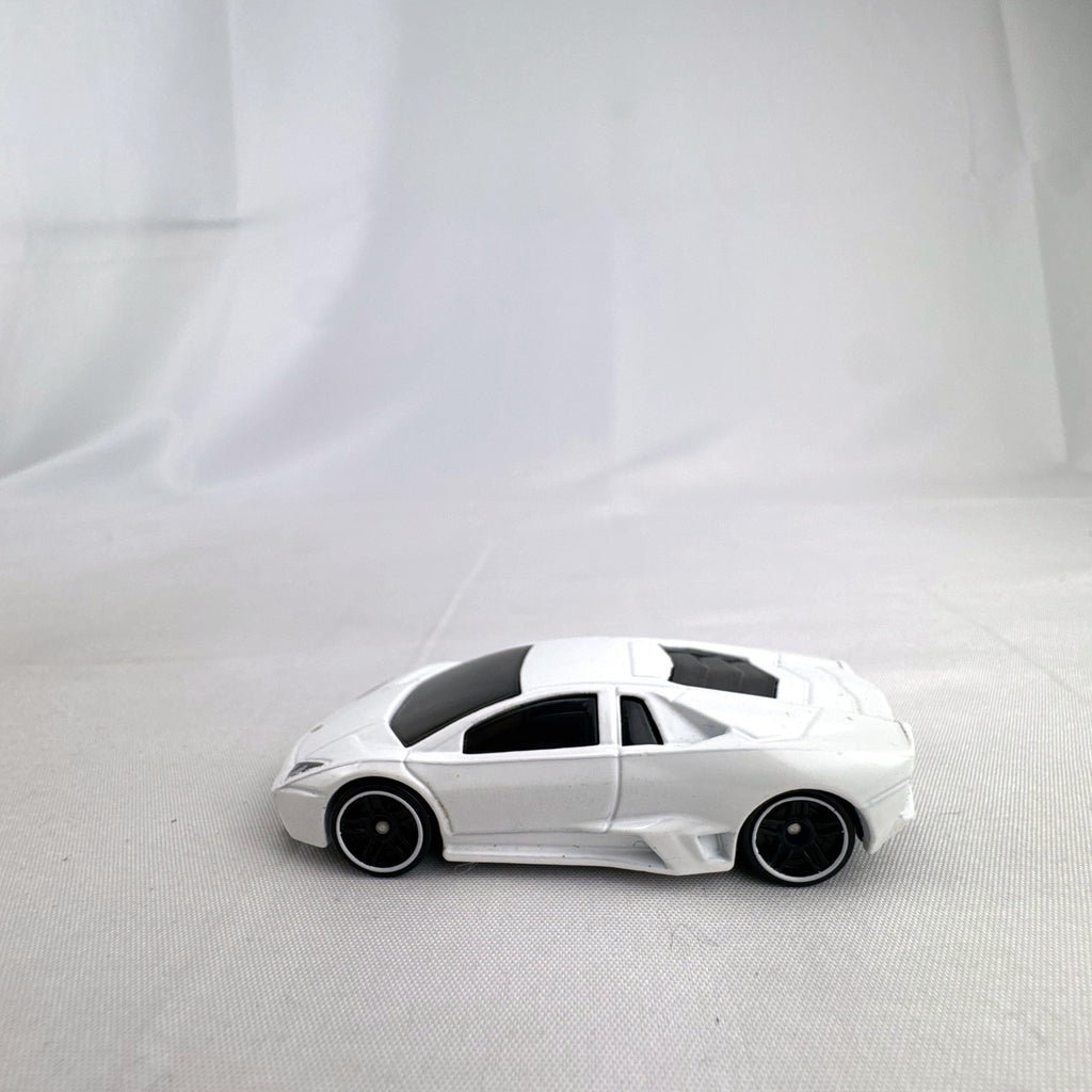White Hot Wheels 1:64 scale diecast Lamborghini Reventón loose model car