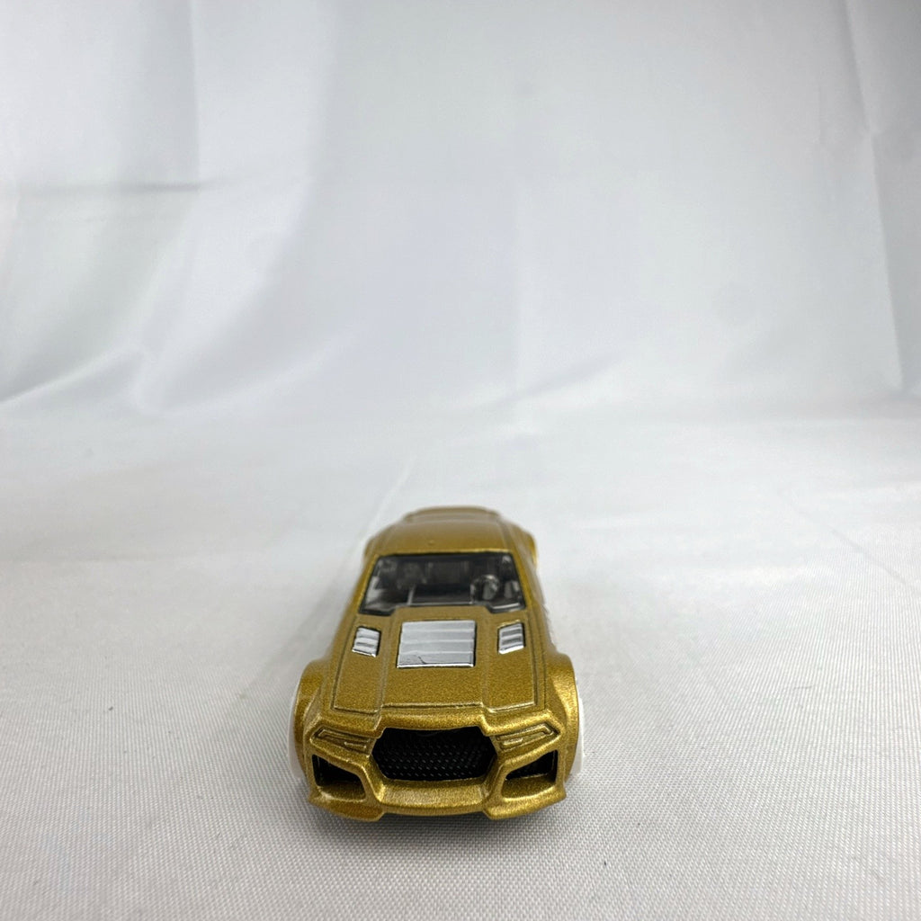 Hot Wheels 1:64 scale Torque Twister diecast car in gold from the 2020 Winter Series