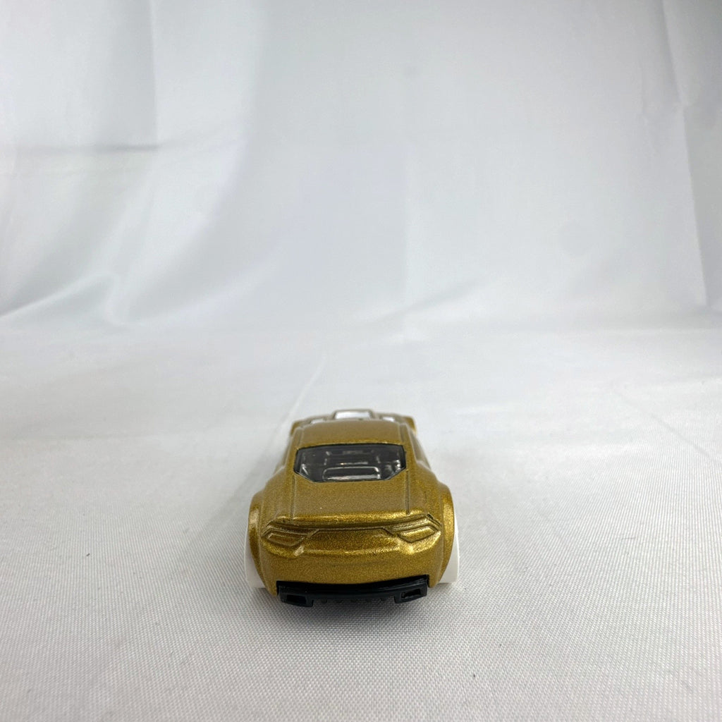 Hot Wheels 1:64 scale Torque Twister diecast car in gold from the 2020 Winter Series