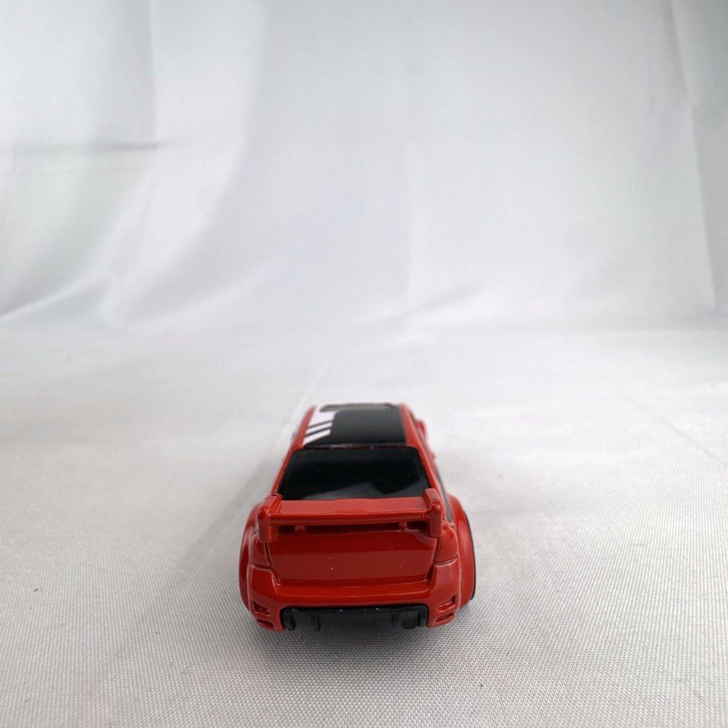 Hot Wheels 1:64 scale 2008 Ford Focus diecast rally car in red with Ford Racing graphics