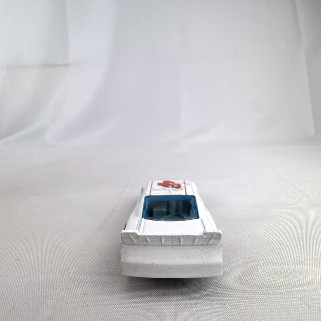 Hot Wheels 1:64 scale 2010 Chevrolet Impala stock car in white with number 4 racing livery