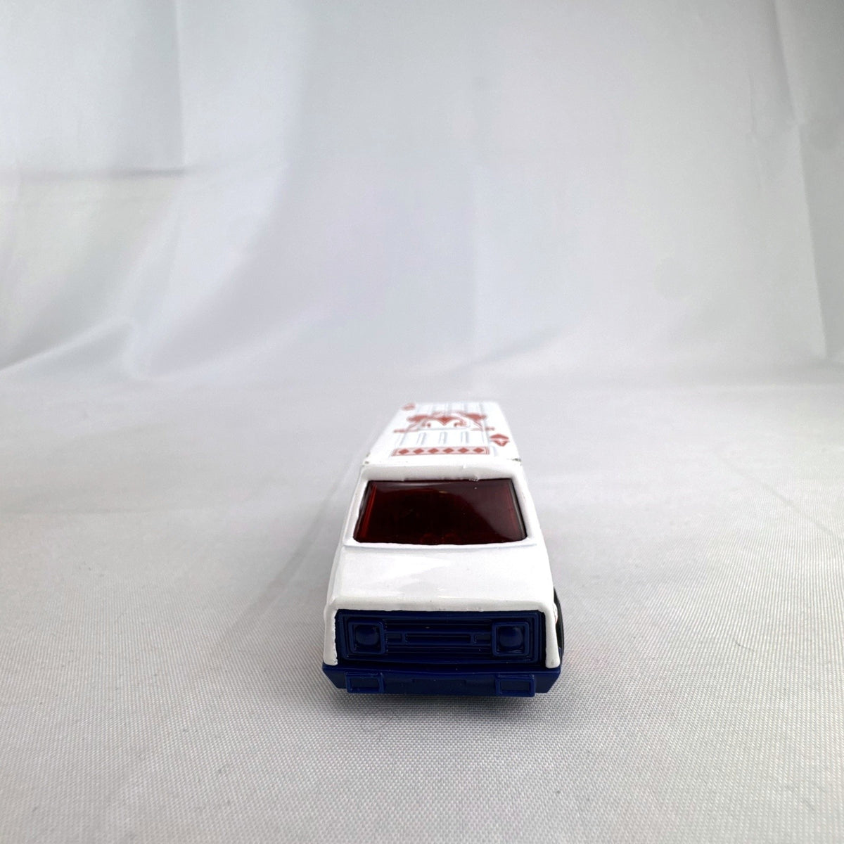 Hot Wheels 1:64 scale Super Van diecast vehicle featuring white King of Hearts playing card graphics