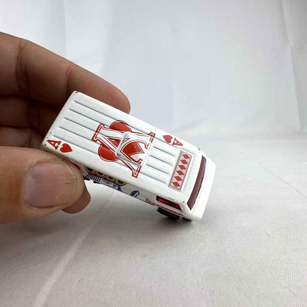 Hot Wheels 1:64 scale Super Van diecast vehicle featuring white King of Hearts playing card graphics
