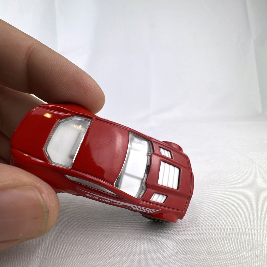 Red Hot Wheels Torque Twister 1:64 scale diecast car with number 32 racing graphics
