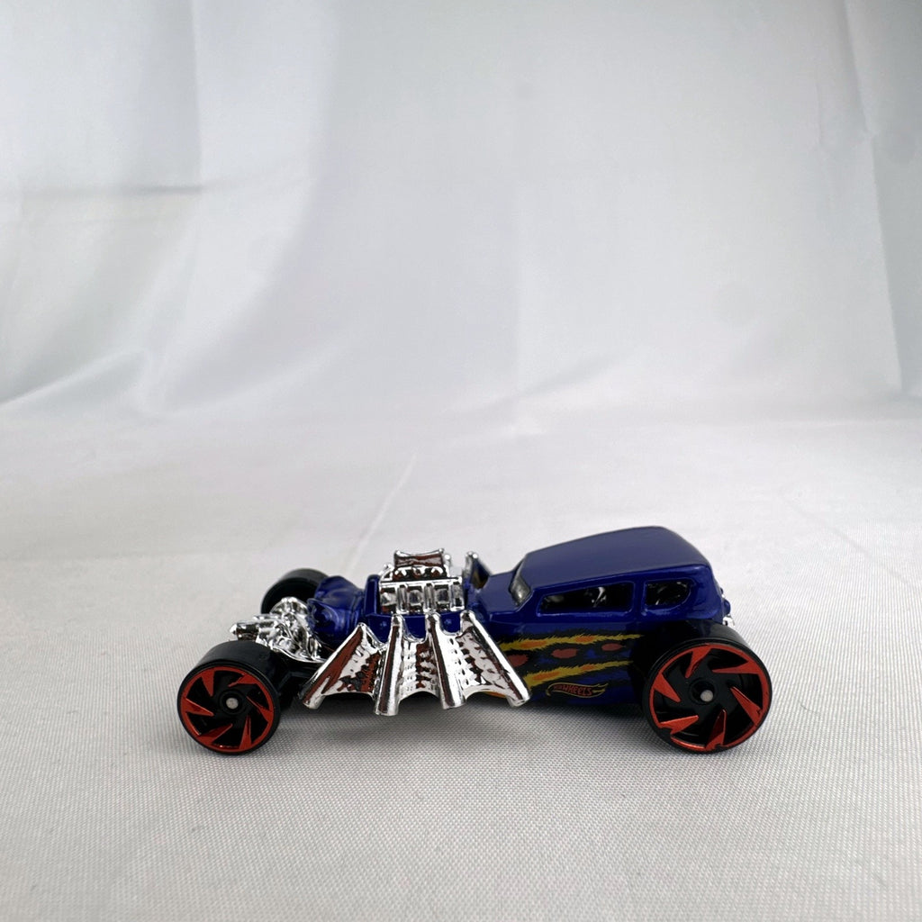 Blue Hot Wheels Street Creeper 1:64 scale diecast car featuring chrome spider engine block