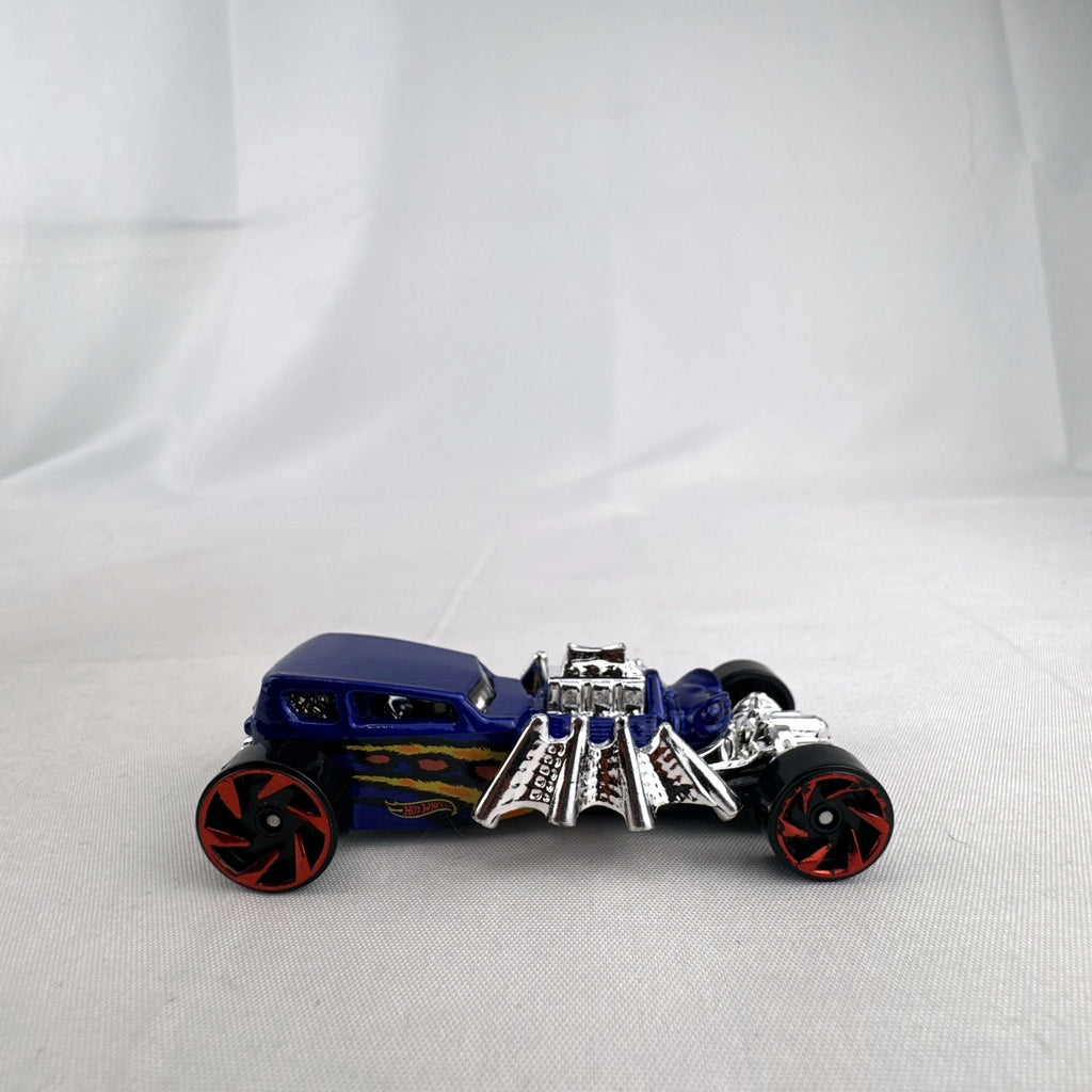 Blue Hot Wheels Street Creeper 1:64 scale diecast car featuring chrome spider engine block