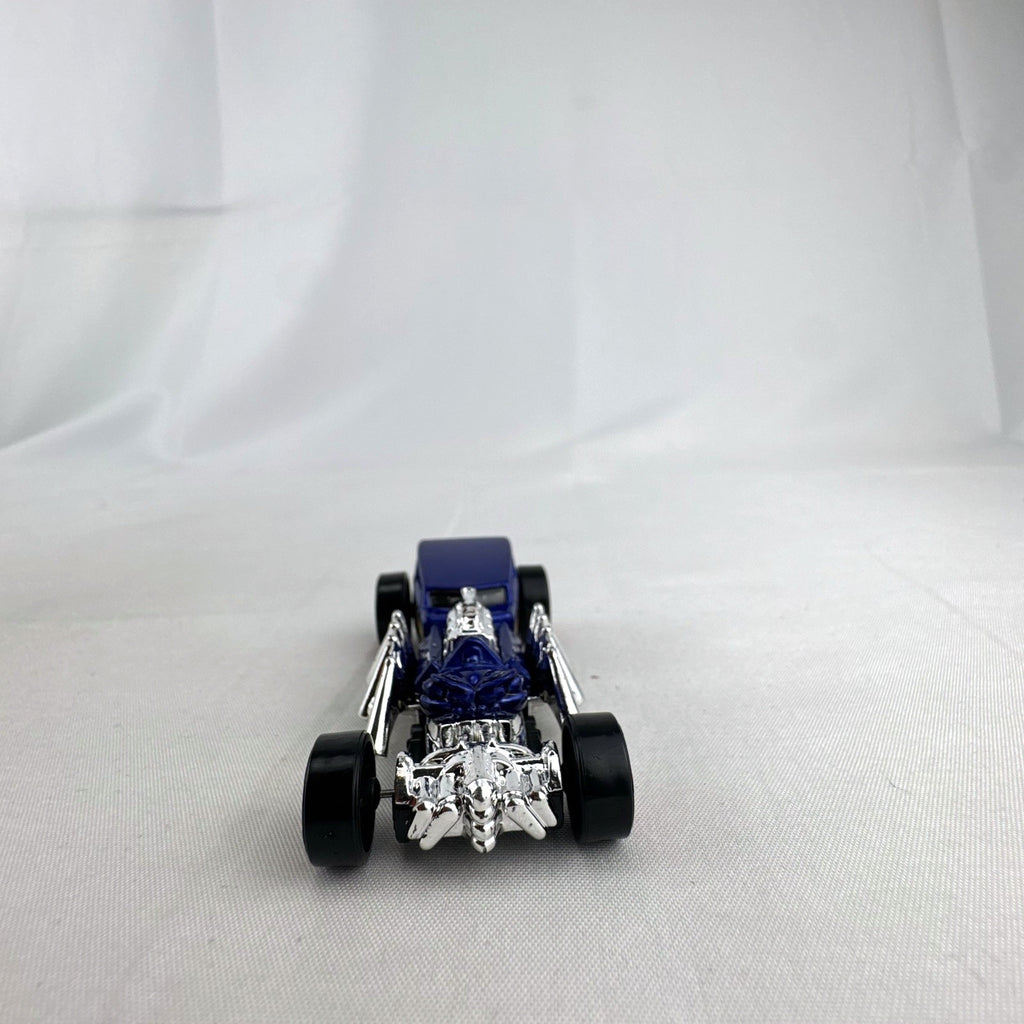 Blue Hot Wheels Street Creeper 1:64 scale diecast car featuring chrome spider engine block