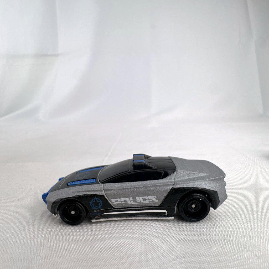 Hot Wheels Alpha Pursuit 1:64 scale police interceptor diecast car in metallic silver and black