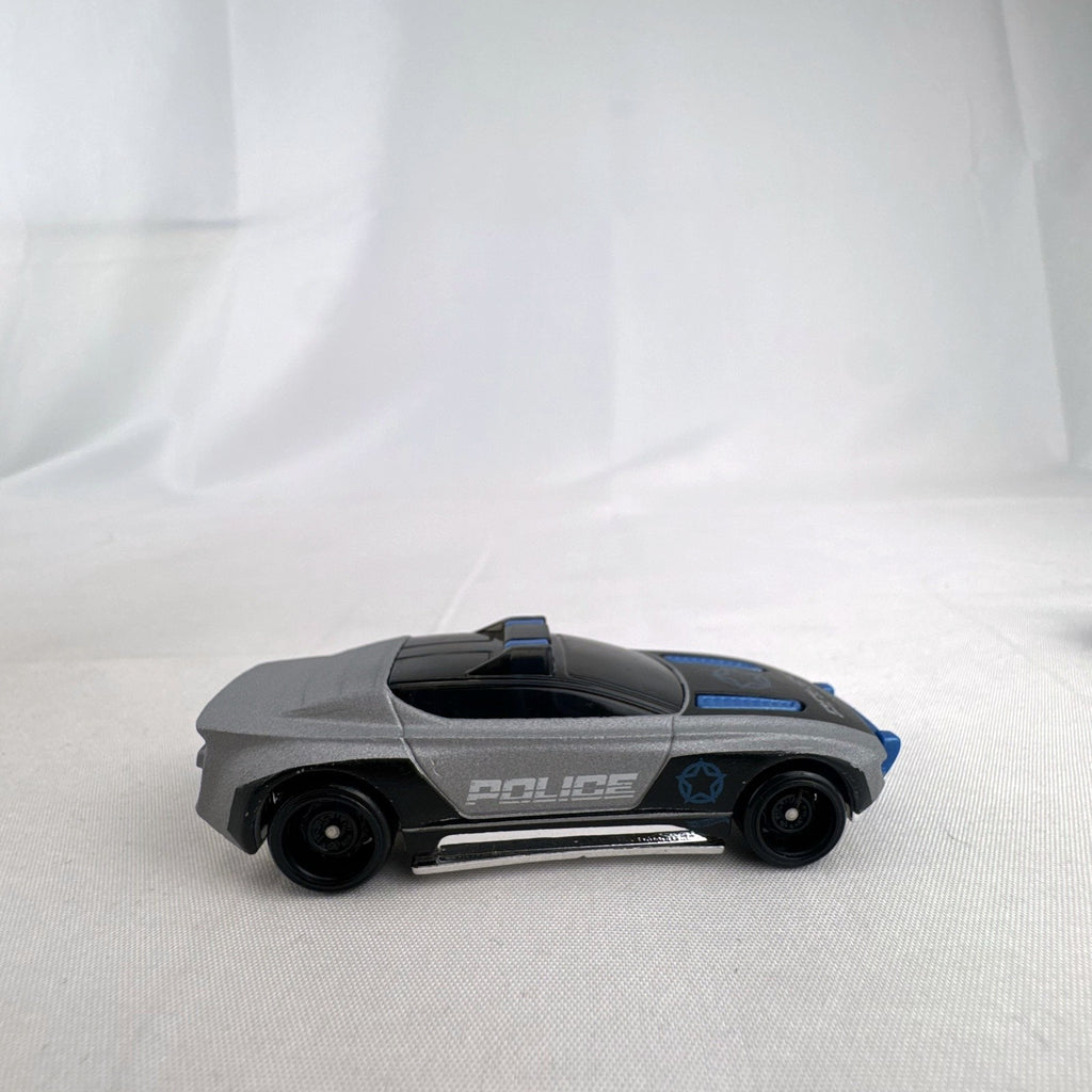 Hot Wheels Alpha Pursuit 1:64 scale police interceptor diecast car in metallic silver and black