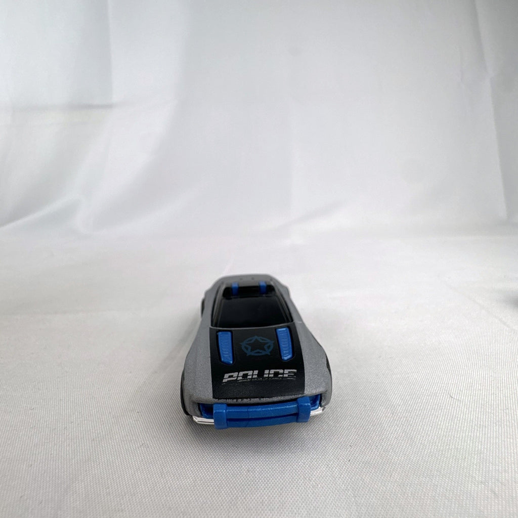 Hot Wheels Alpha Pursuit 1:64 scale police interceptor diecast car in metallic silver and black