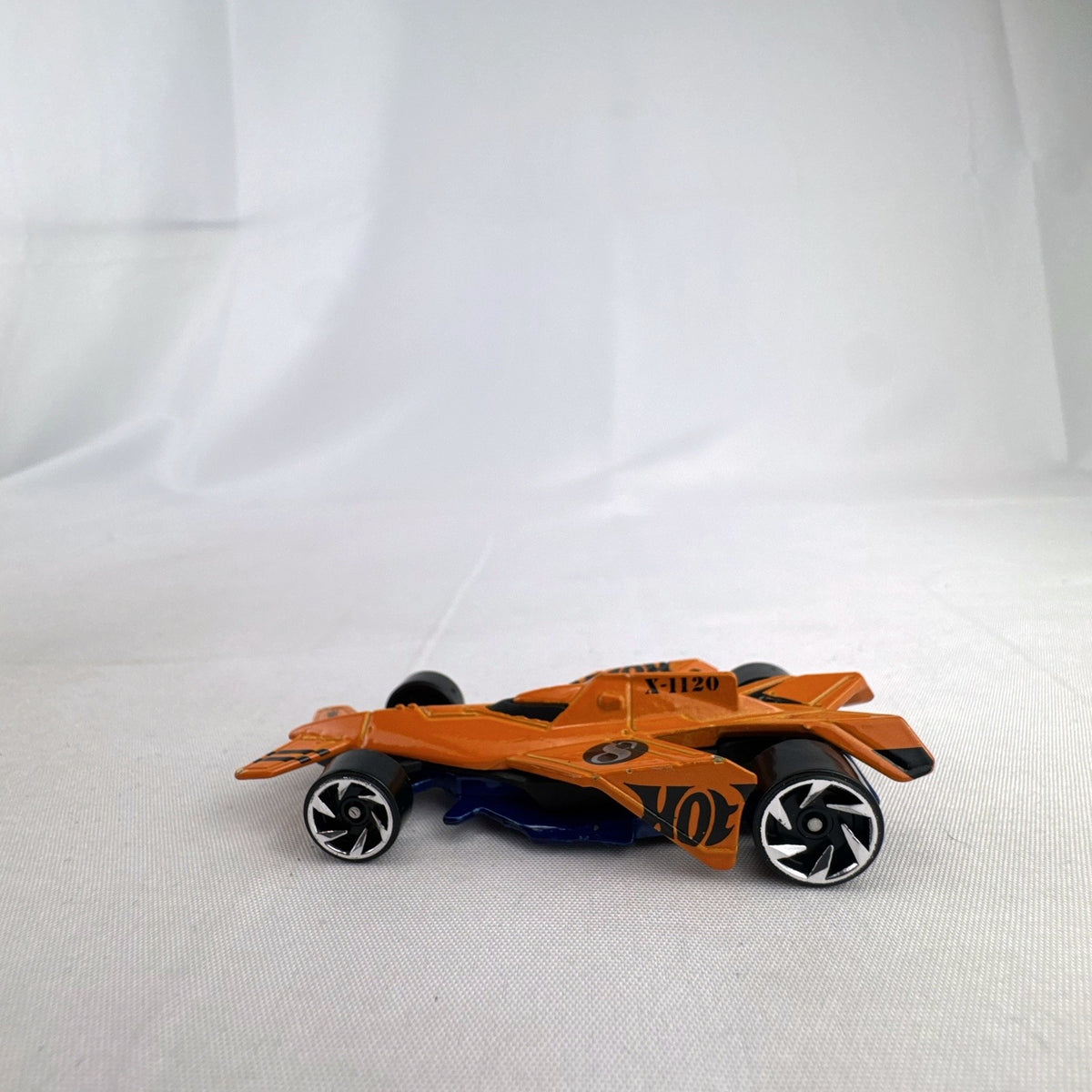 Orange Hot Wheels Cloud Cutter 1:64 scale diecast car from Mystery Models Series 2
