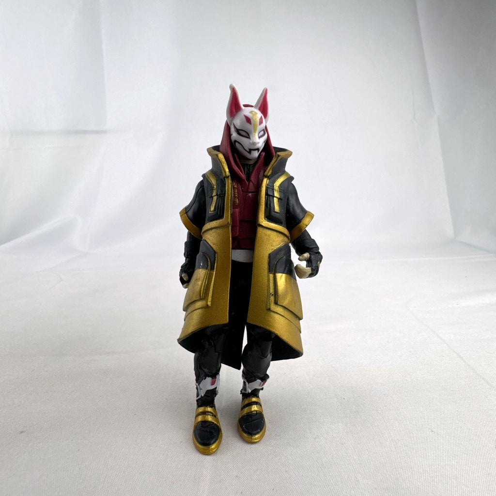 Jazwares Fortnite Drift Stage 5 four-inch action figure wearing black and gold cloak and Kitsune mask
