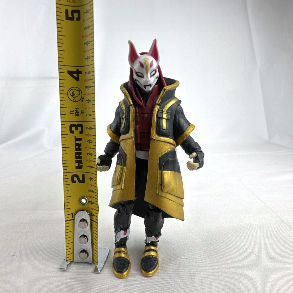 Jazwares Fortnite Drift Stage 5 four-inch action figure wearing black and gold cloak and Kitsune mask