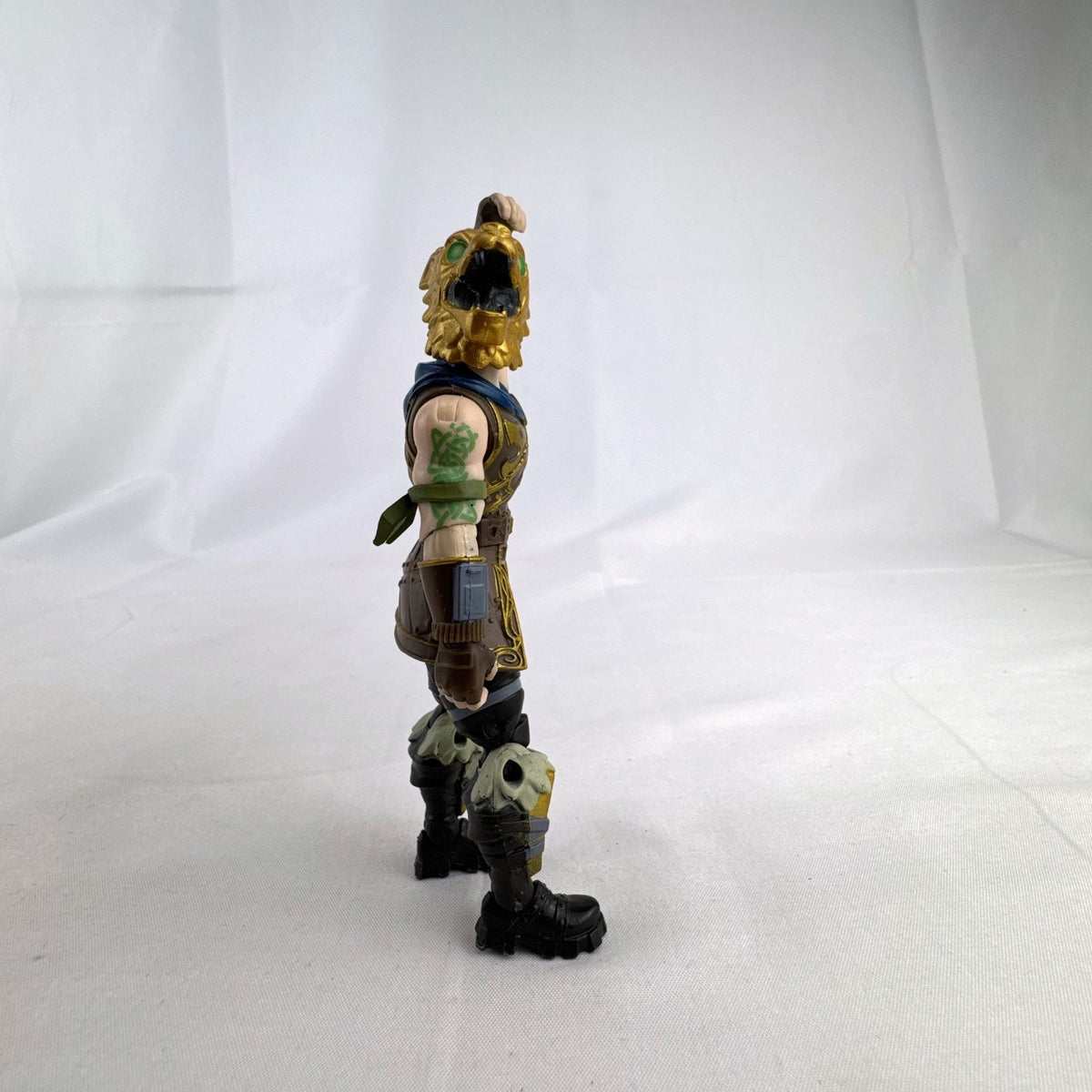 Jazwares Fortnite Battle Hound 4-inch action figure wearing gold wolf mask and Viking armor