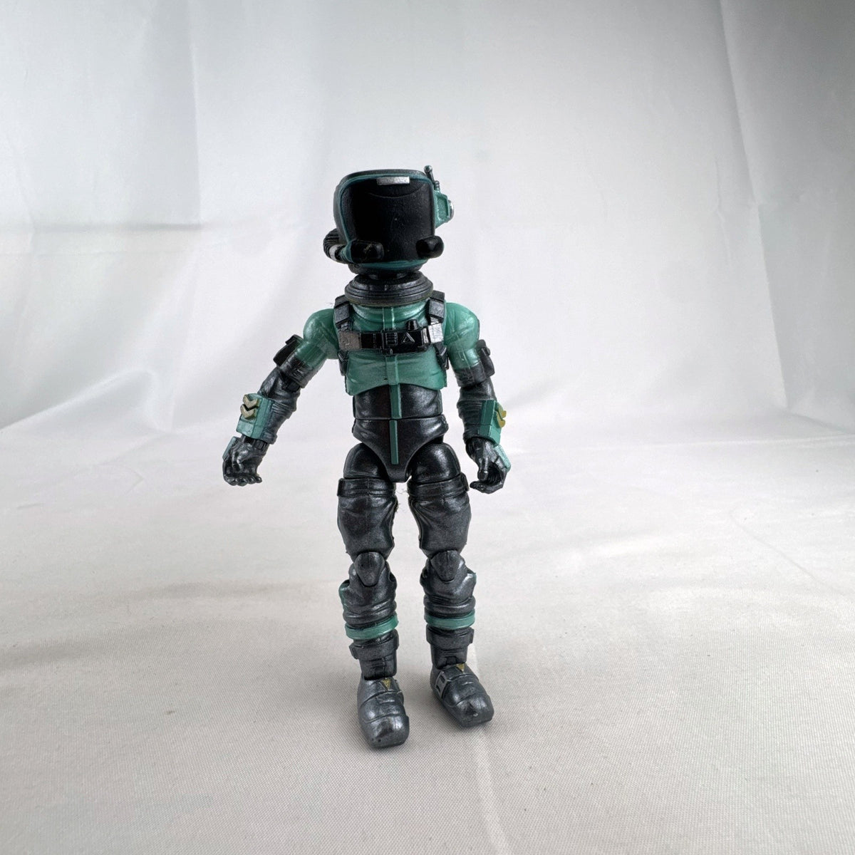 Jazwares Fortnite Eternal Voyager 4-inch plastic action figure in teal astronaut armor