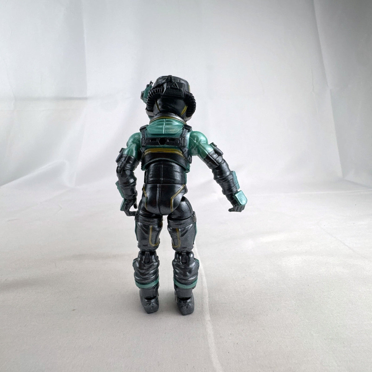 Jazwares Fortnite Eternal Voyager 4-inch plastic action figure in teal astronaut armor