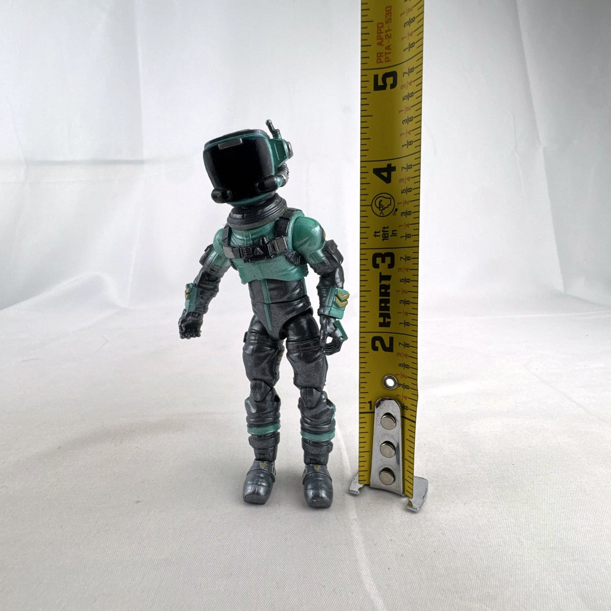 Jazwares Fortnite Eternal Voyager 4-inch plastic action figure in teal astronaut armor