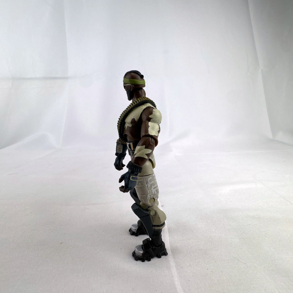 Jazwares Fortnite Bandolier 4-inch plastic action figure with tactical ammo sash