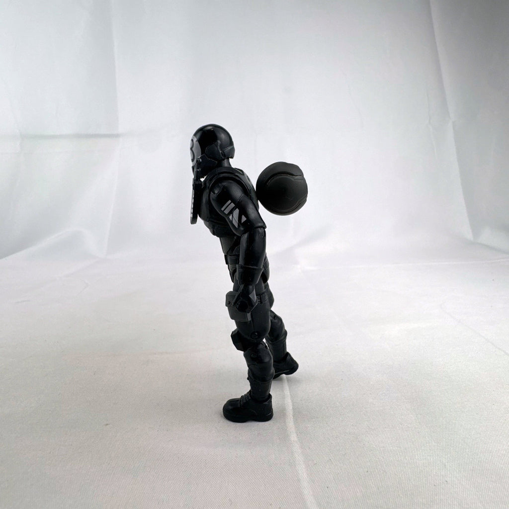 Jazwares Fortnite Solo Mode 4-inch 8-Ball action figure in black suit with back bling accessory