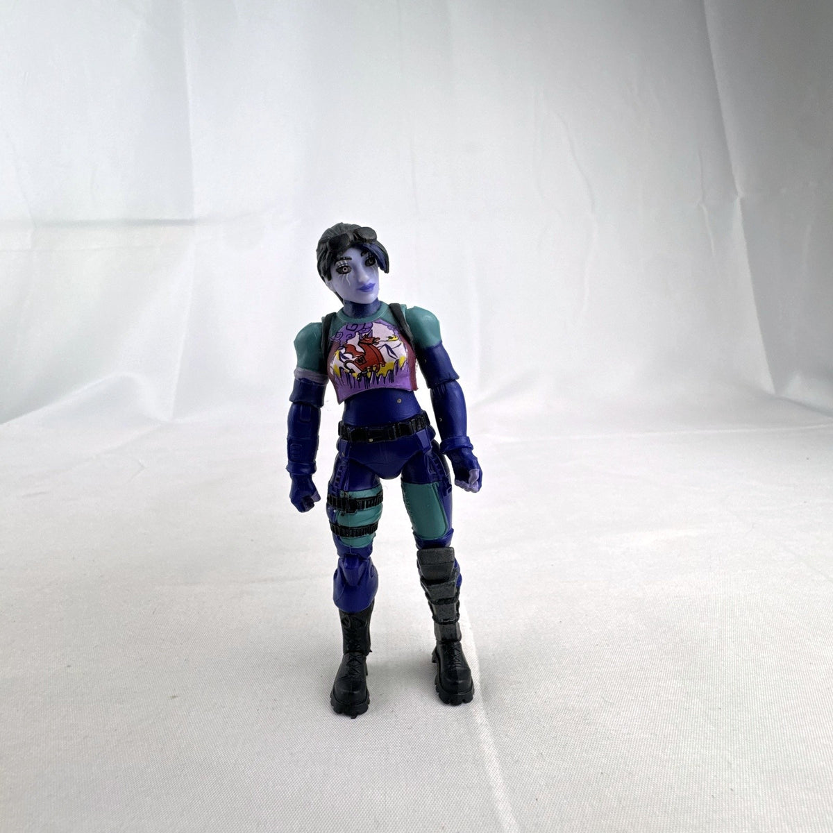 Jazwares Fortnite 4-inch Dark Bomber articulated action figure with purple detailing in loose condition
