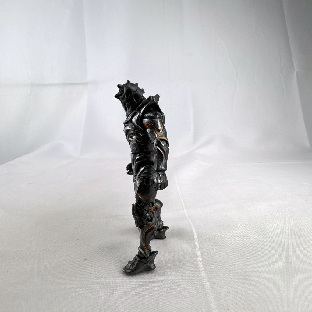 Jazwares Fortnite Ruin action figure with metallic armor and orange lava details.