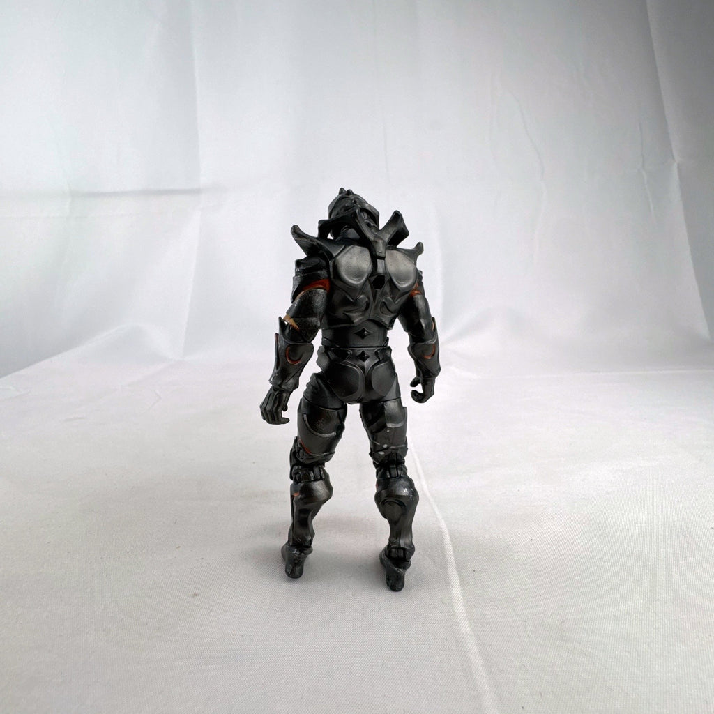 Jazwares Fortnite Ruin action figure with metallic armor and orange lava details.