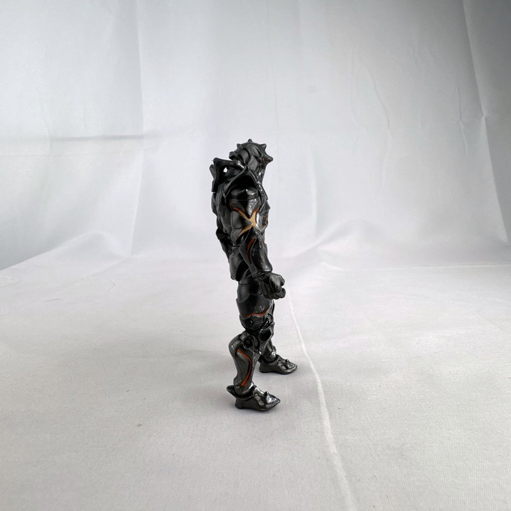 Jazwares Fortnite Ruin action figure with metallic armor and orange lava details.