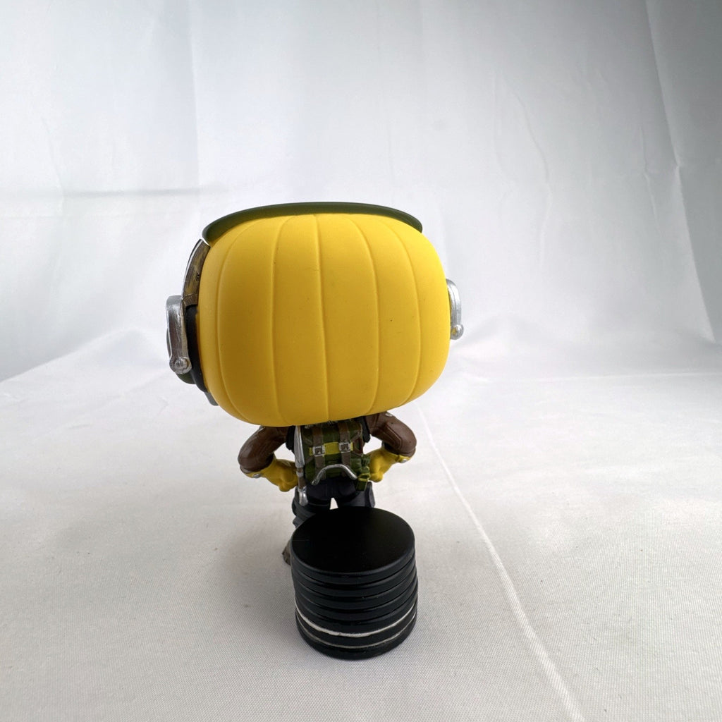 Funko Pop! Games Fortnite Raptor #436 vinyl figure in signature yellow mask and tactical gear.
