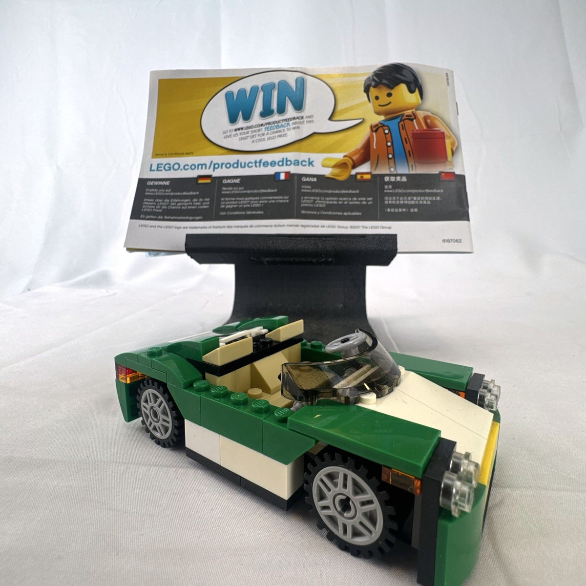 Assembled LEGO Creator 31056 Green Cruiser convertible sports car with instruction manual