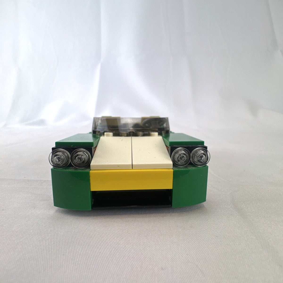 Assembled LEGO Creator 31056 Green Cruiser convertible sports car with instruction manual