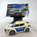 LEGO City Police Patrol Car set 60239 with police officer minifigure and instruction manual