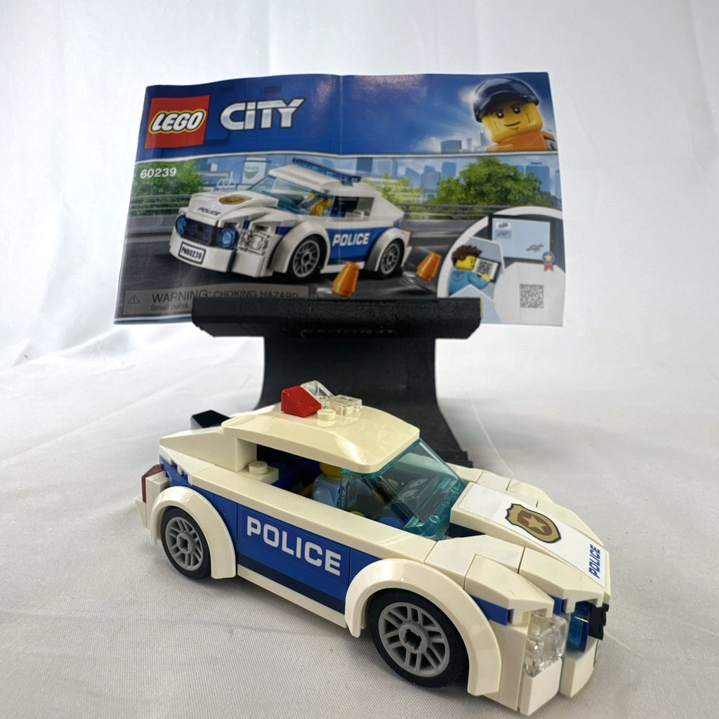 LEGO City Police Patrol Car set 60239 with police officer minifigure and instruction manual