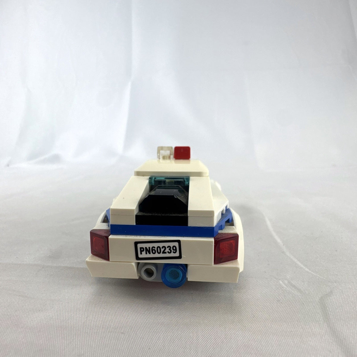 LEGO City Police Patrol Car set 60239 with police officer minifigure and instruction manual