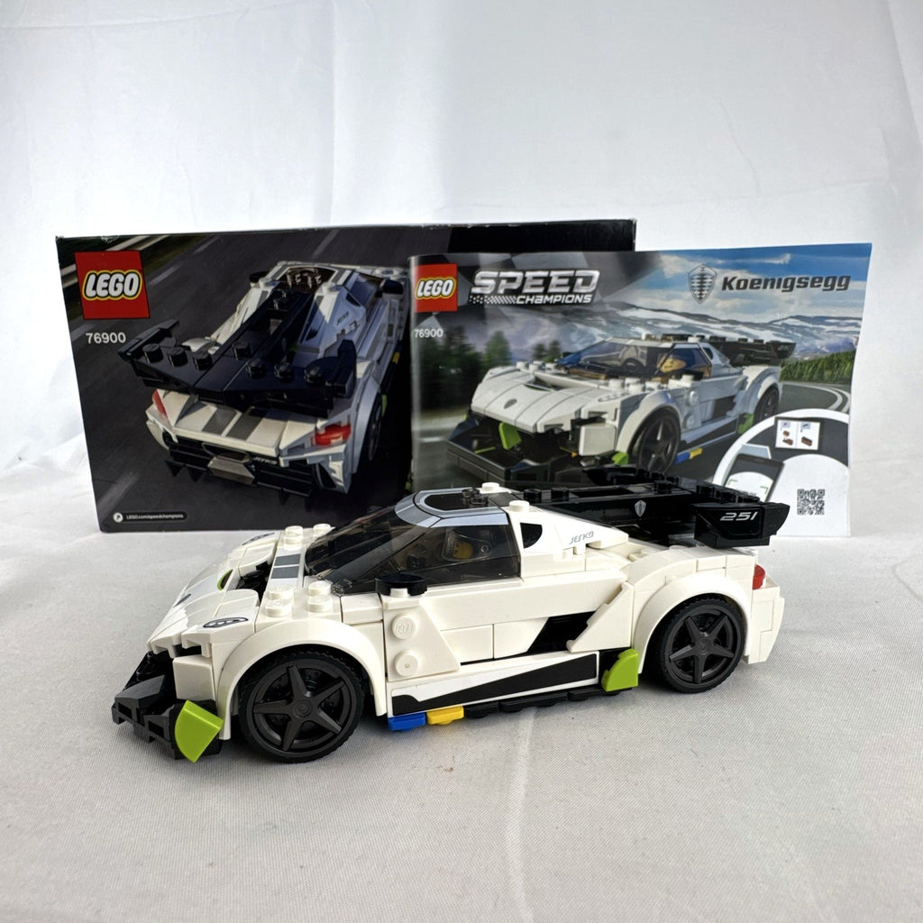 Assembled LEGO Speed Champions Koenigsegg Jesko 76900 white race car with original packaging and instruction booklet