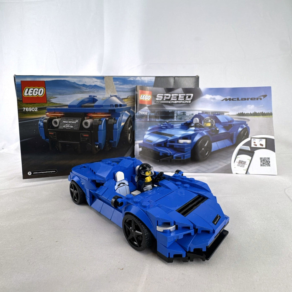 Assembled LEGO Speed Champions McLaren Elva set 76902 in blue with racing minifigure and original box