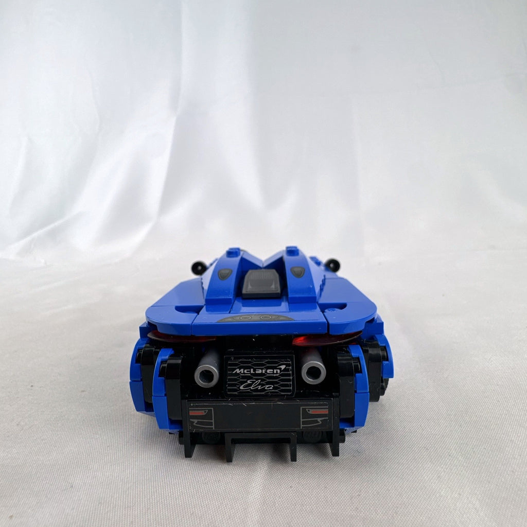 Assembled LEGO Speed Champions McLaren Elva set 76902 in blue with racing minifigure and original box