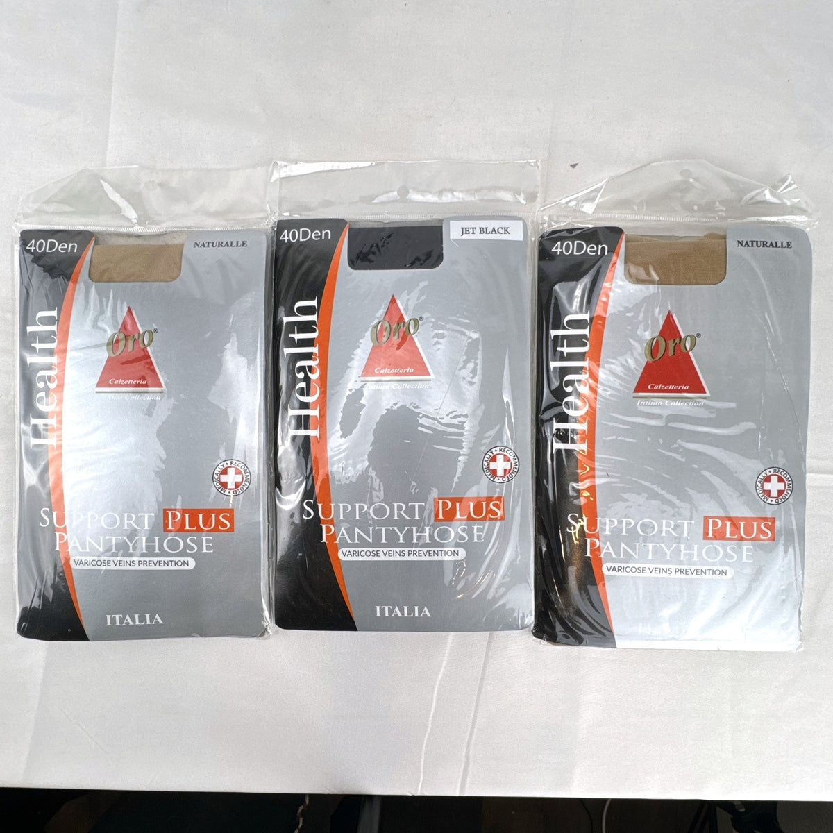 Pack of three Oro Health Support Plus 40 denier compression pantyhose in original unopened packaging.