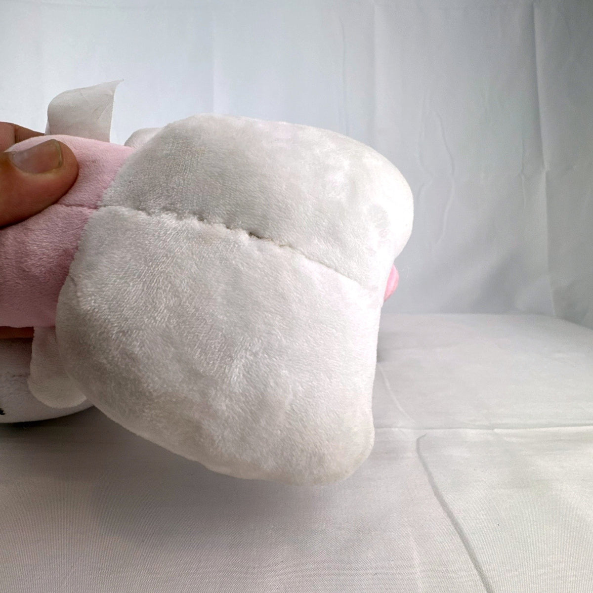 Pair of Sanrio Hello Kitty plush dolls wearing blue and pink overalls, measuring approximately 7 inches tall.