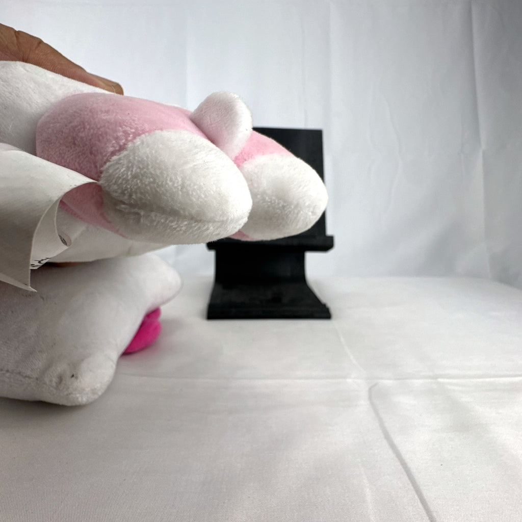Pair of Sanrio Hello Kitty plush dolls wearing blue and pink overalls, measuring approximately 7 inches tall.