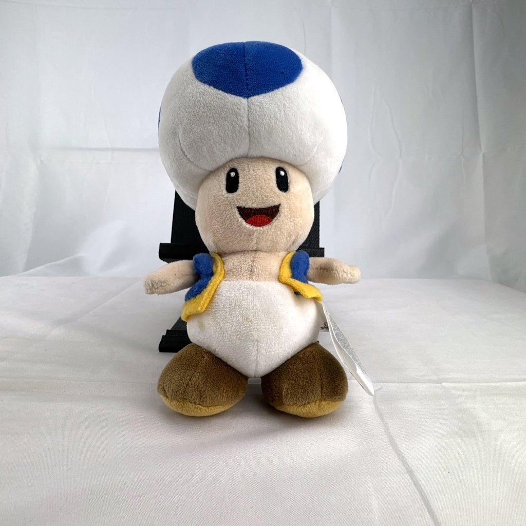 Nintendo Super Mario Bros. Blue Toad 7-inch plush toy with blue vest and spotted cap